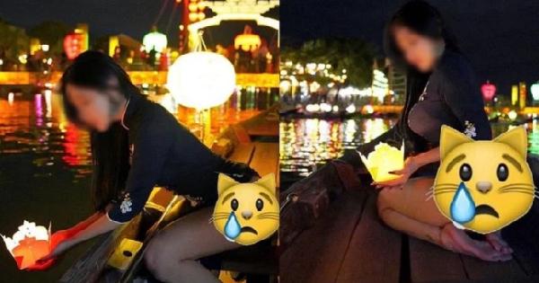 Nữ du khách mặc áo dài Việt Nam nhưng thiếu quần tạo dáng phản cảm trên sông Hoài, Hội An