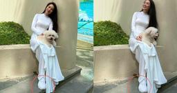 Hiền Thục diện áo dài trắng nền nã nhưng nhìn xuống đôi giày lại sai sai