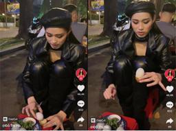 Hồn nhiên như Đỗ Thị Hà, lên đồ lấp lánh kiêu sa vẫn ngồi bệt vỉa hè ăn quà