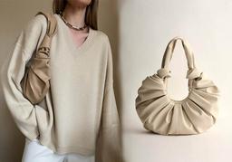 Người mẫu Rosie Huntington-Whiteley yêu thích chiếc túi "đinh" của NTK Lâm Gia Khang