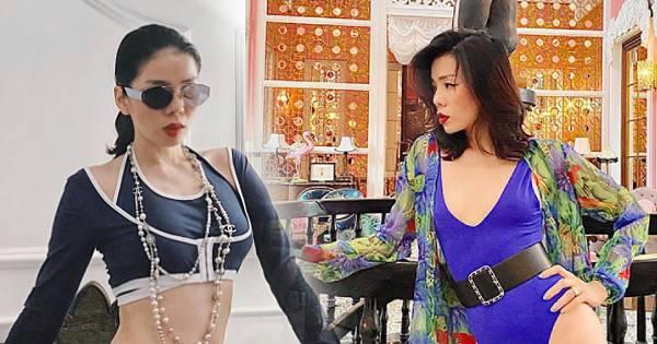 Đứng thôi chưa đủ, Lệ Quyên phải nằm trườn ra chụp ảnh để "tạo nét"