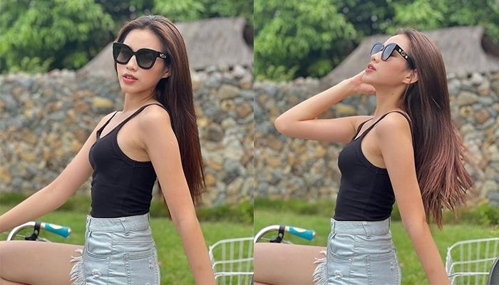 Đỗ Thị Hà mặc quần shorts ngắn áo hai dây đạp xe đạp, khoe nhan sắc mơn mởn tuổi 21