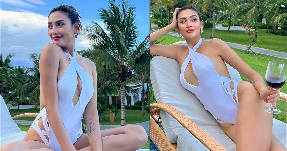 Võ Hoàng Yến diện áo tắm trắng tinh khôi nhưng xẻ bạo, khoe hình thể nuột nà tuổi 34