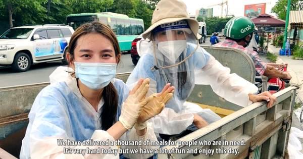 Thùy Tiên mặc áo bảo hộ để giới thiệu về Viêt Nam trong clip giới thiệu tại Miss Grand Internation