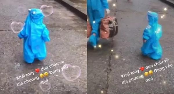 Hình ảnh em bé 3 tuổi mắc ung thư, mặc đồ bảo hộ tung tăng trở về nhà sau 28 ngày cách ly khiến bao người rơi nước mắt
