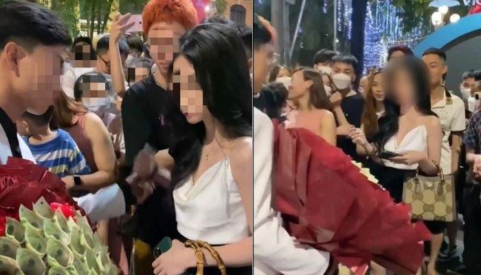 Trai đẹp cầm bó hoa làm bằng tờ 100k đi tỏ tình giữa phố đi bộ, câu trả lời là: Em không thích anh!