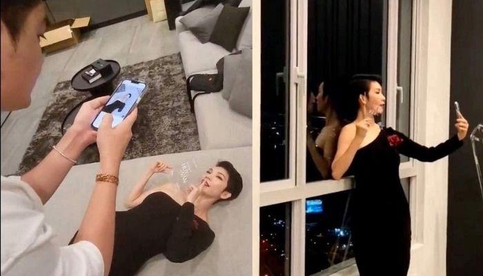 Xuân Lan hết đứng, ngồi lại nằm ngửa trên sofa để "sống ảo" với thiệp cưới của Ngô Thanh Vân