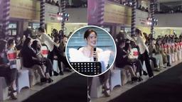 Nam Em gây tranh cãi với hành động "ký đầu" fan khi đang biểu diễn