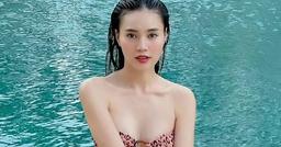 Lan Ngọc lại khoe "đường cong em hơn cả đường đua" mừng tuổi mới