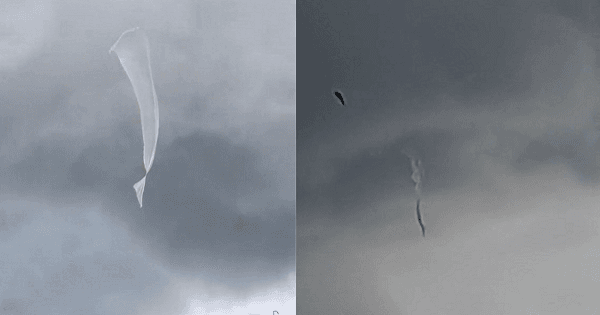 Người dân đổ xô xem hiện tượng lạ trên bầu trời Sài Gòn khi sắp mưa