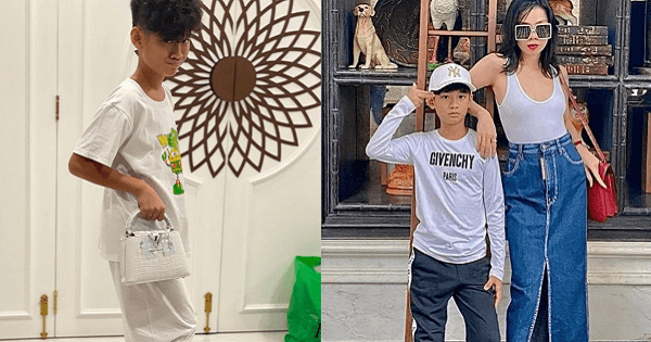 Con trai Lệ Quyên đi giày cao gót, xách túi tiền tỷ của mẹ làm dáng