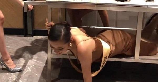 Hoa hậu Lào bò lết dưới gầm bàn tại Miss Grand 2021