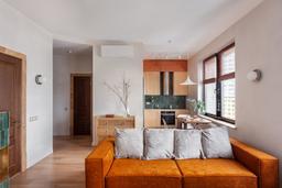 Đẹp xuýt xoa căn hộ 66m² theo phong cách Scandinavian với điểm nhấn nổi bật màu cam gạch