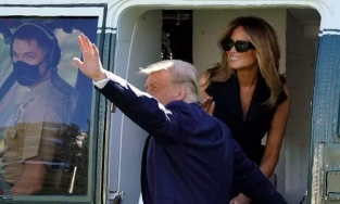 Nghi án bà Melania dùng 'người đóng thế' thay bà đi công cán với ông Trump