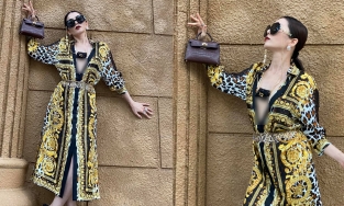 Lệ Quyên dát đồ hiệu từ đầu đến chân, phanh áo để đi rước đèn Trung thu