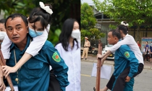 Xúc động hình ảnh bố cõng con gái đi thi THPT Quốc gia 2022