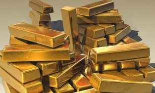 Giá vàng hôm nay 6.4: Vàng thế giới tăng mạnh rồi lao dốc