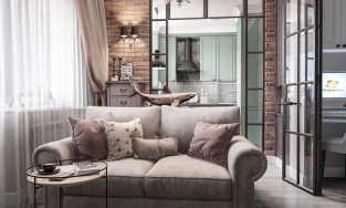 Căn hộ 38m² của cặp vợ chồng son với tường gạch trầm ấm và góc bếp màu xanh bơ tuyệt đẹp