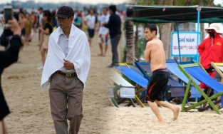 Người dân mặc áo khoác xuống biển tắm, 2 phút đã phải đi lên trong kì nghỉ lễ 30/4 - 1/5