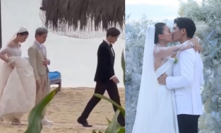 Huy Trần vô tư lướt phăng phăng đi trước để Ngô Thanh Vân nặng nề xách váy cưới theo sau