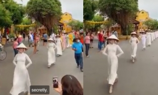 Màn biểu diễn áo dài lạ lùng ở Hội An khiến netizen phán 'thoái hoá cột sống, thoát vị đĩa đệm'