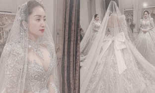 Khánh Thi mặc váy cưới lóng lánh kiêu sa, vòng một căng tràn chiếm spotlight