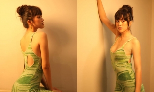 Tiểu Vy diện váy hở trên khoét dưới nhưng lại may bằng vải len ấm áp