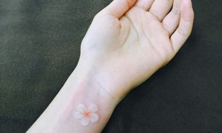 Hình xăm mực trắng độc đáo được giới trẻ ưa chuộng