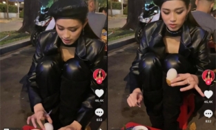 Hồn nhiên như Đỗ Thị Hà, lên đồ lấp lánh kiêu sa vẫn ngồi bệt vỉa hè ăn quà