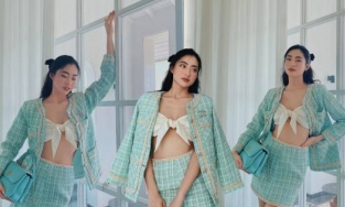 Đi biển nhưng lại mặc áo dạ, đích thị Hoa hậu Lương Thùy Linh