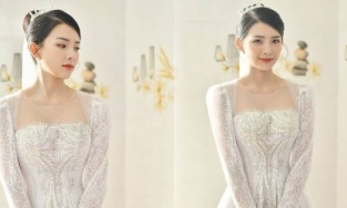 Sau áo dài 40 triệu, vợ Phan Mạnh Quỳnh tiếp tục diện váy cưới 87,5 triệu