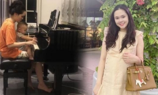 Bà xã Duy Mạnh mặc đồ bộ, tóc túm vội ngồi ôm con như mẹ bỉm bình dân