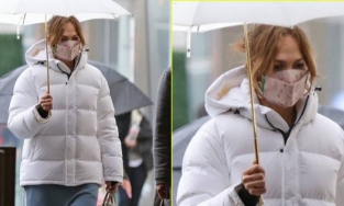 Vắng Ben Affleck, Jennifer Lopez để mặt mộc, một mình đi dưới mưa rét