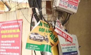 Dán quảng cáo ở cột điện sẽ bị phạt đến 2 triệu đồng từ ngày 1/6