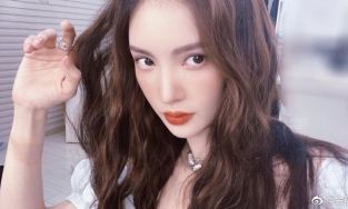 Kim Thần phủ nhận tin hẹn hò sau khi lộ cảnh ôm hôn trai lạ trong ô tô