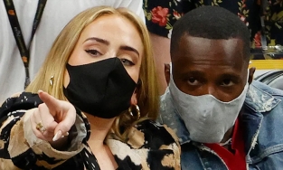 Adele đi xem bóng rổ cùng trai lạ, liên tục ghé tai thân thiết