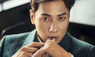 Em út Shinhwa kết hôn với bạn gái kém 9 tuổi