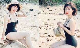 Mẹ 2 con Thanh Hương mặc áo tắm, được khen 'trẻ như đôi mươi'