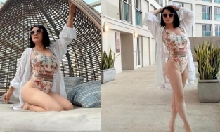 Vợ cũ Bằng Kiều diện áo tắm trưng trổ 3 vòng căng nuột ở tuổi U60 