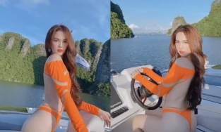 Khoảnh khắc Ngọc Trinh được nhà thiết kế nam thoa kem chống nắng gây sốt