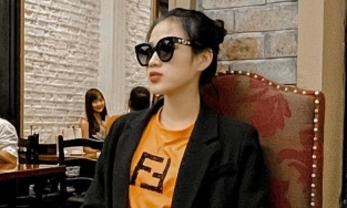 Đỗ Thị Hà diện đồ sành điệu, thần thái ngời ngời đi 'ăn nhẹ' ngày 8/3