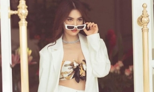 Vừa dọn về biệt thự ở cùng Vũ Khắc Tiệp, Ngọc Trinh liền lên đồ khoe dáng 