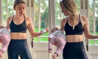 Mỹ nhân Amber Heard (Aquaman) bế con gái 5 tháng tuổi như... cầm tạ tập gym