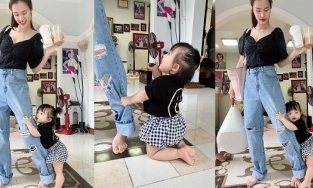 Con gái Đông Nhi đu chân mẹ không cho đi làm