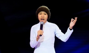 'Tiểu ni cô' Huyền Trân hát nhạc Trịnh tại The Voice Kids 2014 là ai?