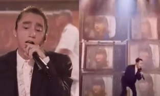 Sơn Tùng hát live với background tràn ngập hình ảnh Hải Tú