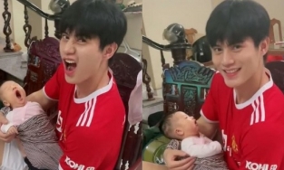 Trai đẹp 9X đăng clip bế cháu, nhiều chị em đòi thay vị trí của em bé