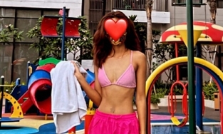 H'Hen Niê đi chân đất mặc quần đùi vẫn xứng danh 'The Body' của showbiz Việt