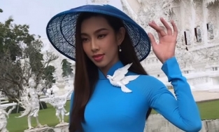 Không còn diện trang phục Thái, Thùy Tiên thả dáng với áo dài Việt khoe nhan sắc tầm quốc tế