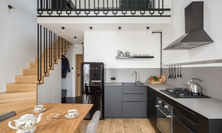 Căn hộ 52m² ở Ba Lan với phòng khách được bố trí trên tầng lửng